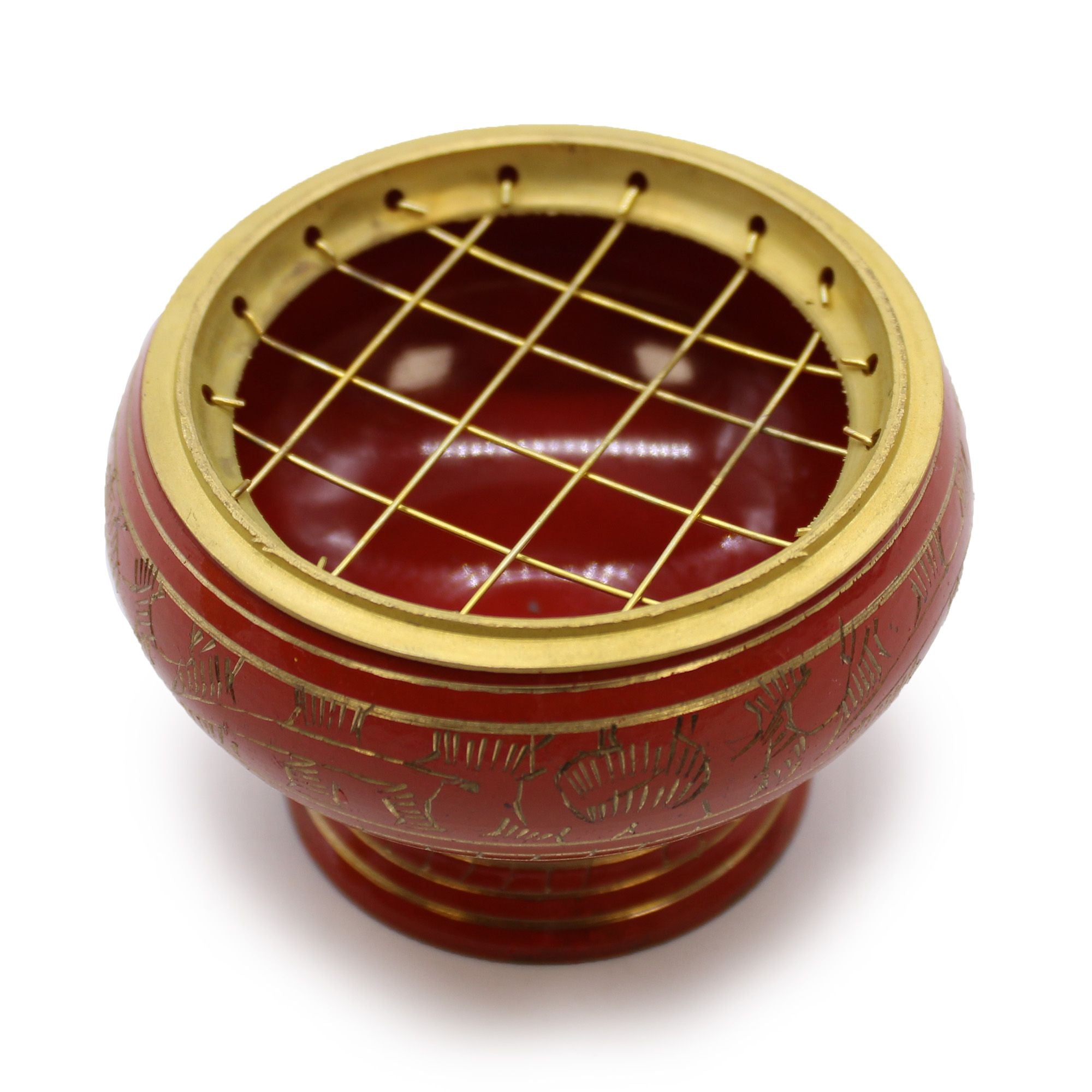 Détail du brûleur d’encens orange et or en laiton avec grille or pour charbon, chakra sacré, vue du dessus