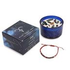 Bougie astrologique Belier avec cristaux et bracelet en pierres naturelles présentés en coffret cadeau