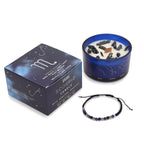 Bougie astrologique Scorpion avec cristaux et bracelet en pierres naturelles présentés en coffret cadeau