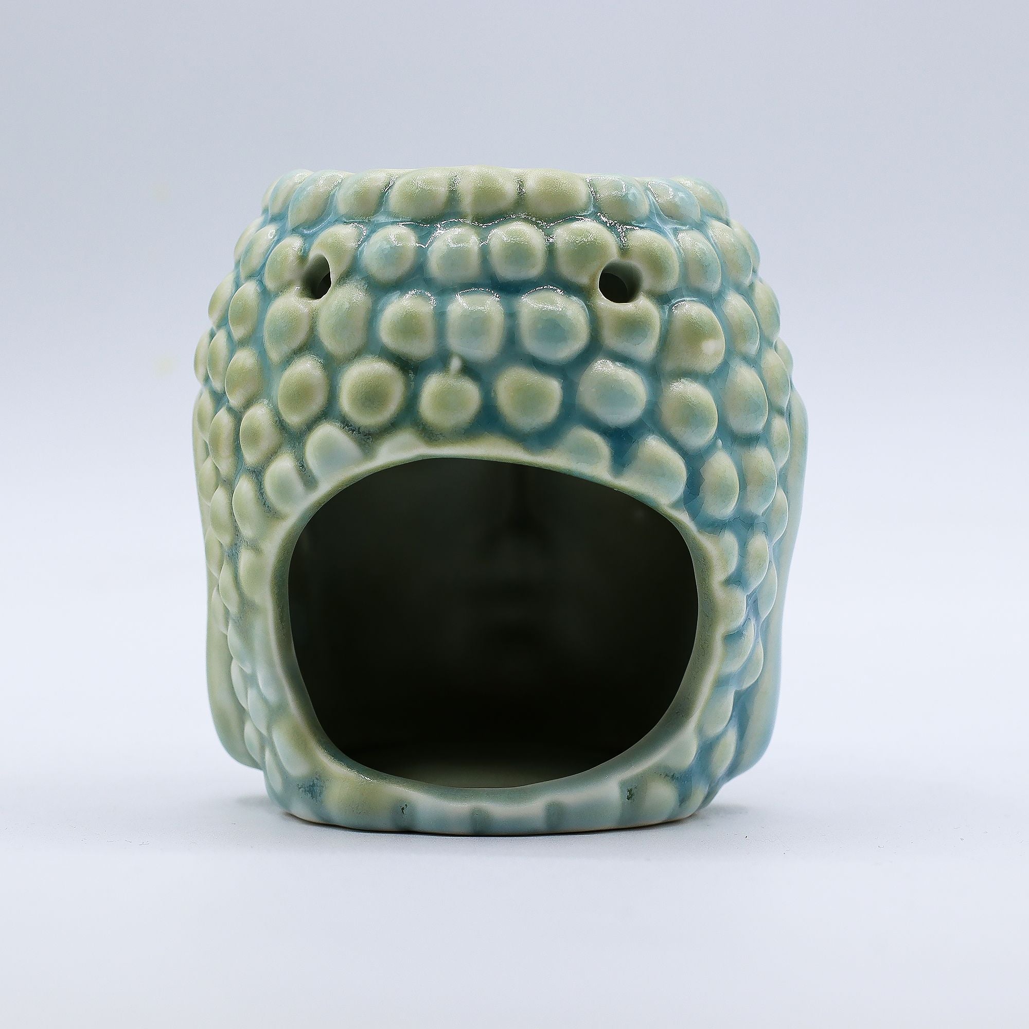 Arrière du brûleur Bouddha bleu avec ouverture pour bougie chauffe-plat diffusion huiles essentielles