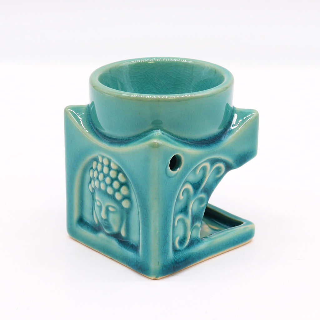 Vue de côté du brûleur Bouddha carré bleu poudré montrant la coupelle supérieure pour diffusion d’huiles essentielles
