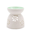 brûleur à huile en céramique blanche avec motifs floraux pour diffusion de parfum et ambiance relaxante