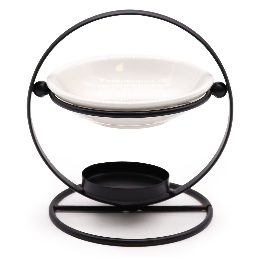 Diffuseur huiles essentielles rond en céramique et métal avec design minimaliste moderne