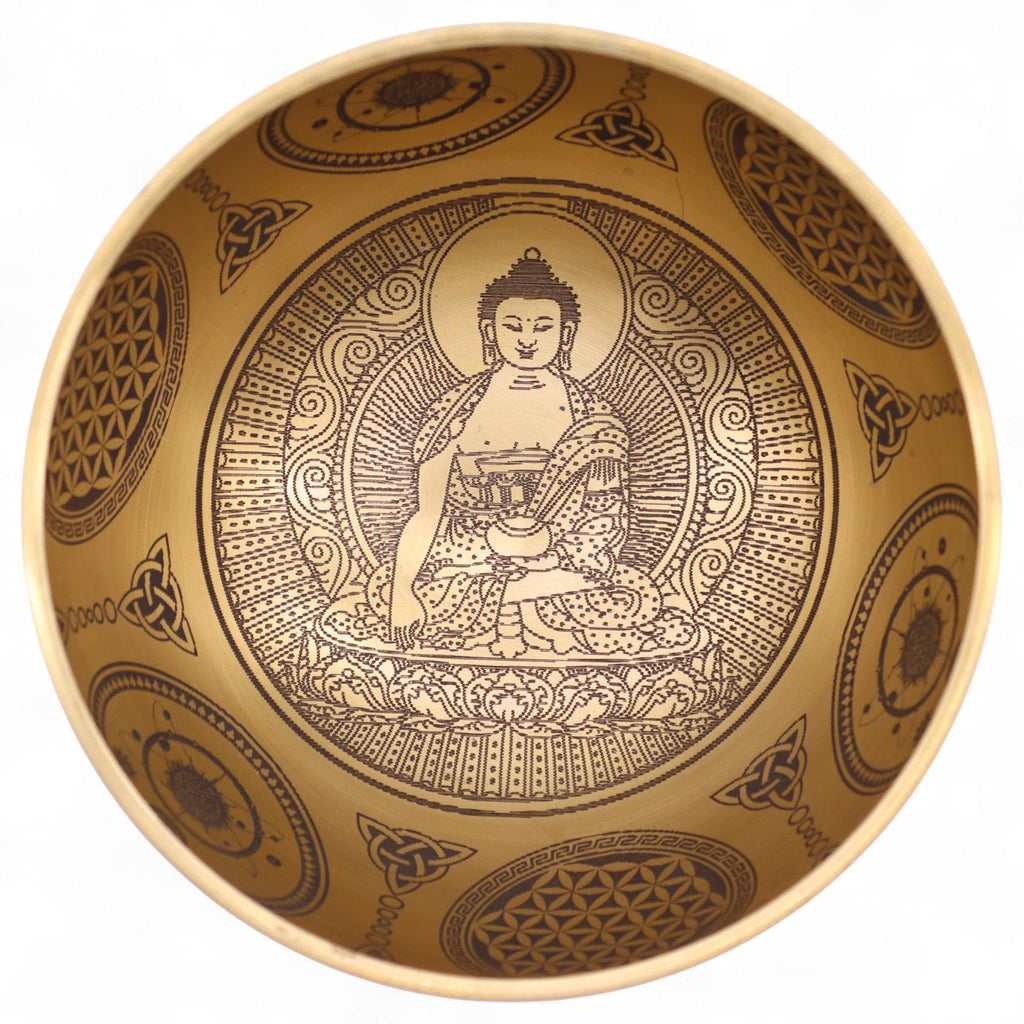 Intérieur d’un bol chantant tibétain bouddha avec gravure détaillée de Bouddha et symboles spirituels