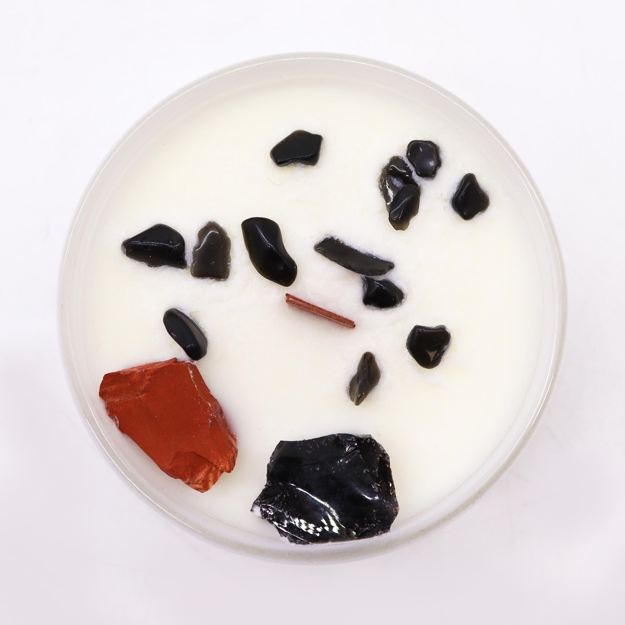 bougie chakra racine avec jaspe rouge pour ancrage et stabilite