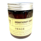 Bougie aromathérapie peace 200g à l’huile essentielle de lavande et géranium dans un pot en verre ambré, vue produit sur fond blanc