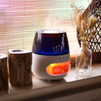 Diffuseur effet flamme utilisé dans un intérieur cosy avec lumière chaleureuse