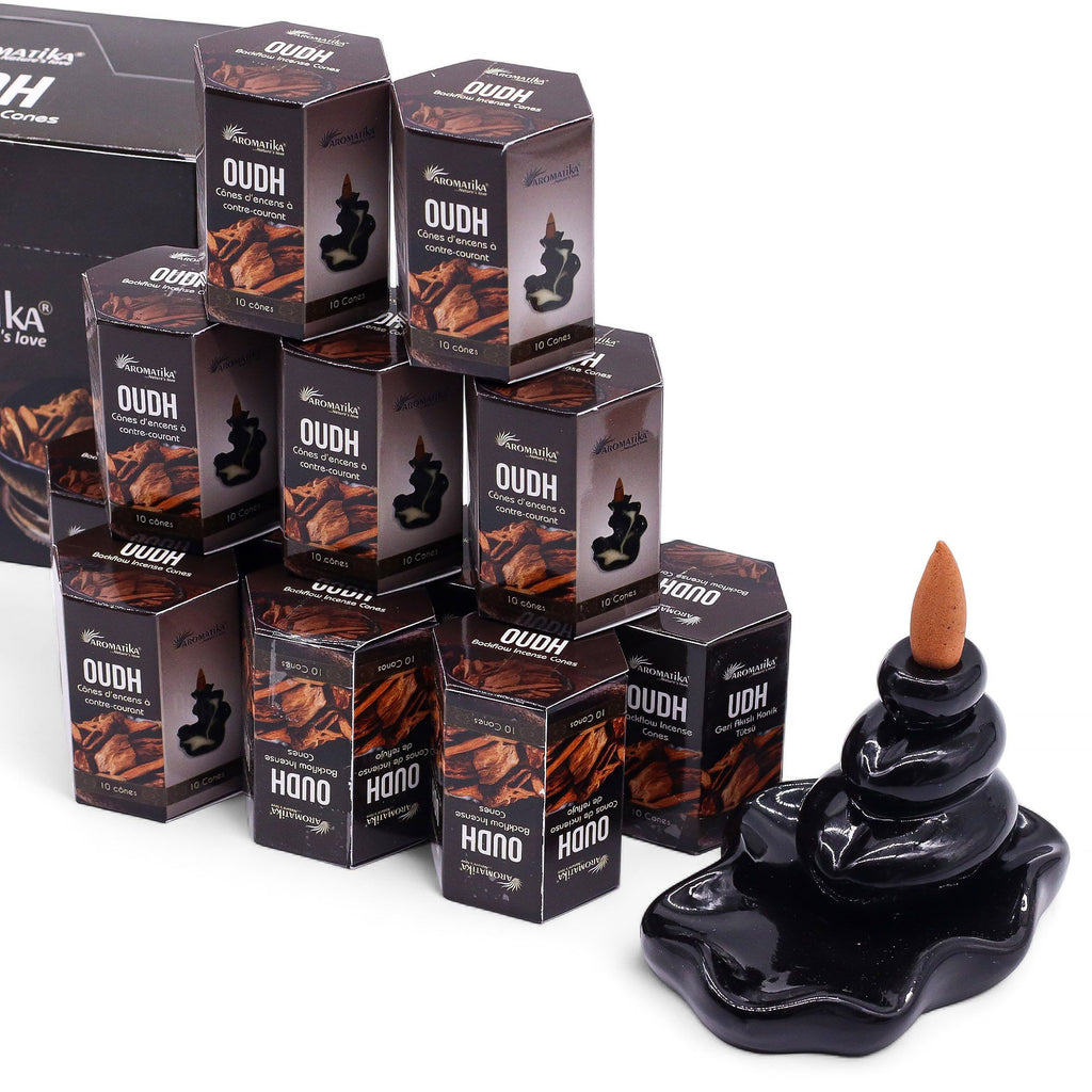 plusieurs boîtes d’encens backflow masala aromatika parfum oudh empilées pack de 10 cônes d’encens
