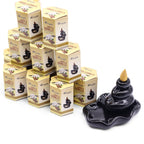 plusieurs boîtes d’encens backflow masala aromatika parfum santal vanille empilées pack de 10 cônes d’encens