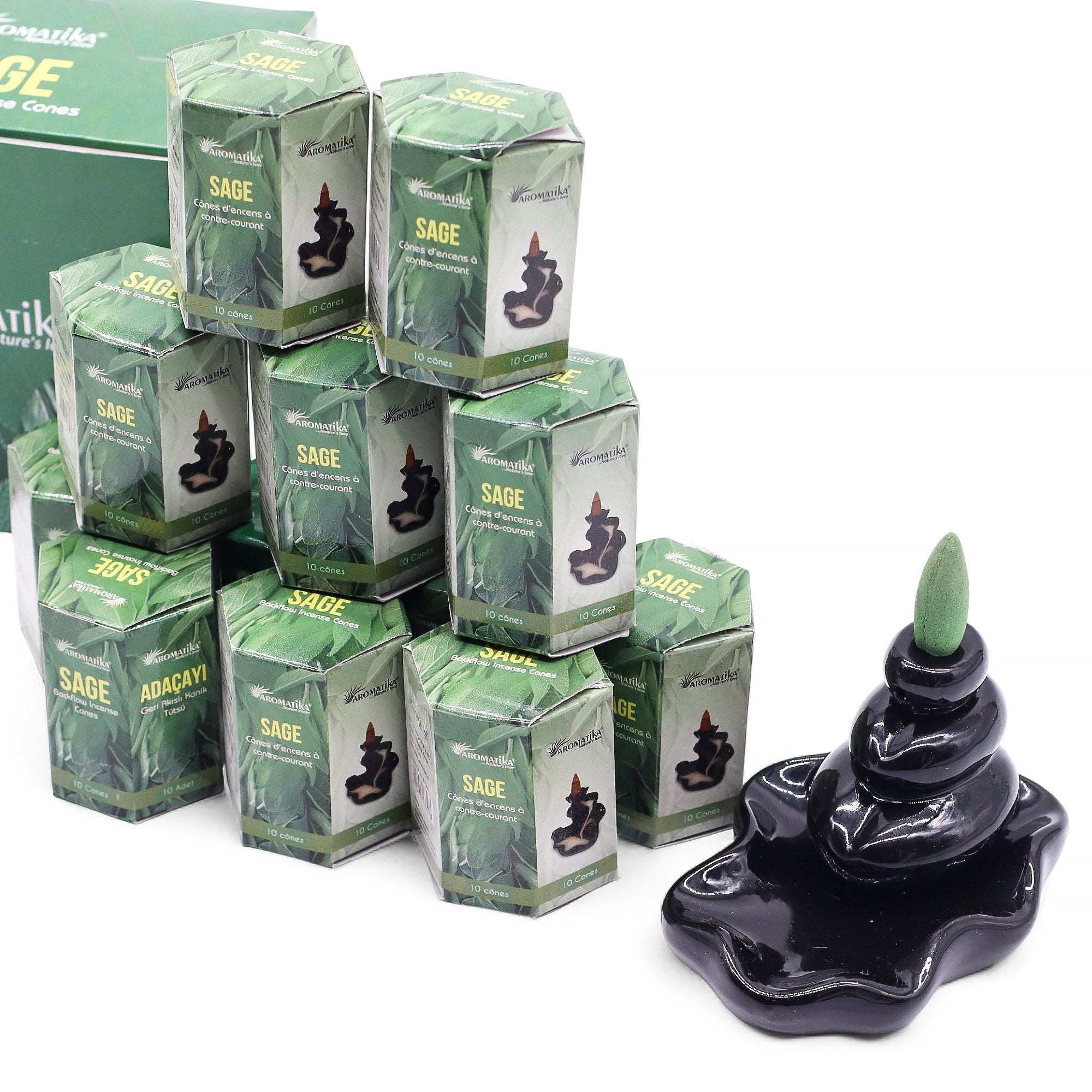 plusieurs boîtes d’encens backflow aromatika masala parfum sauge empilées pack de 10 cônes d’encens