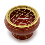 Détail du brûleur d’encens orange et or en laiton avec grille or pour charbon, chakra sacré, vue du dessus