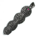 Porte-encens Bouddha long 20 cm en métal, vue de dessus avec motifs gravés, idéal pour rituel de méditation et décoration zen.