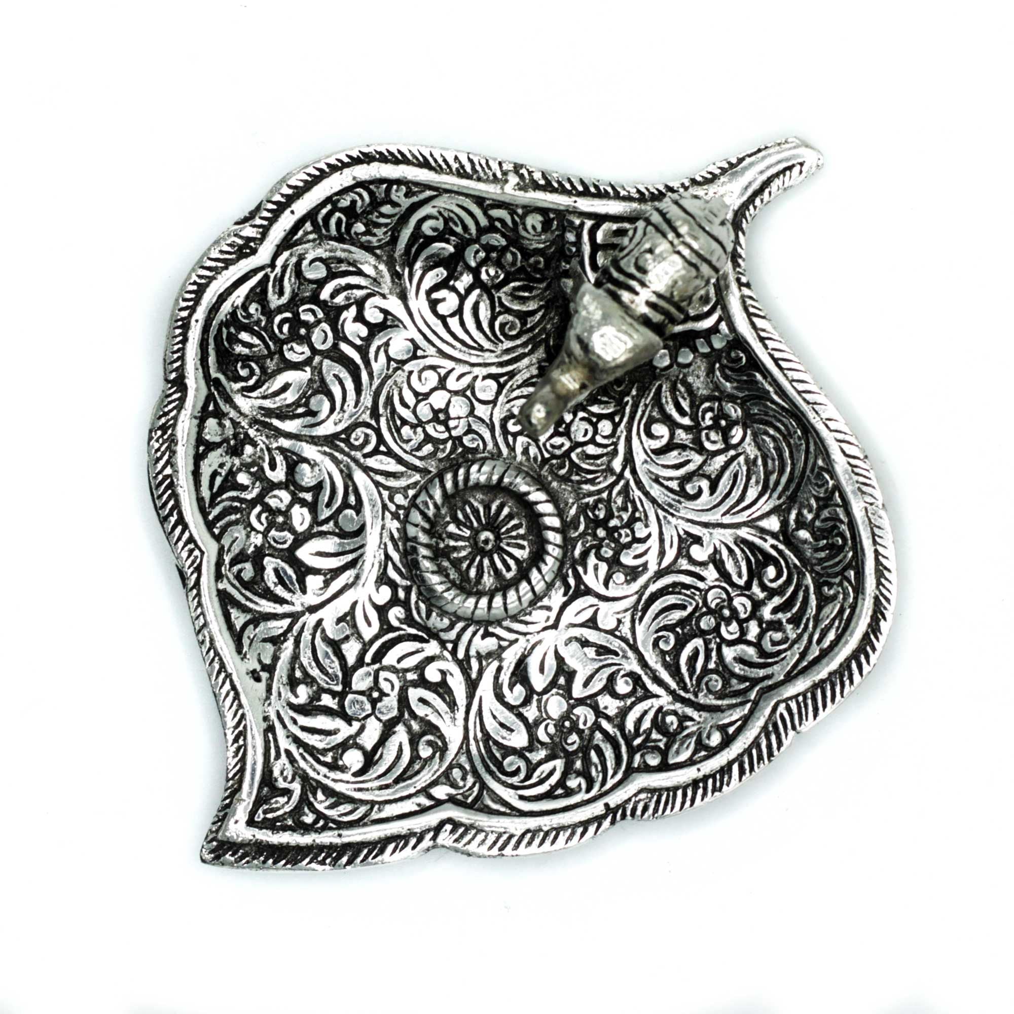 Porte-encens feuille et éléphant 11 cm en métal, vue dessus détaillée, idéal pour rituel de méditation et décoration spirituelle zen.